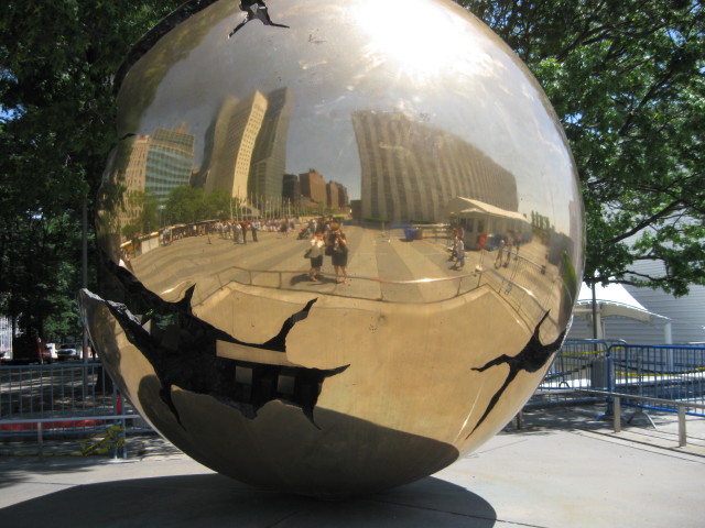 The iconic "Sphere Within Sphere" sculpture at UN Headquarters, symbolizing the emergence of a more peaceful world from the complex, fractured machinery of the old. Defend International aligns its advocacy within this international arena to reshape frameworks governing disarmament, human security, and modern health diplomacy.