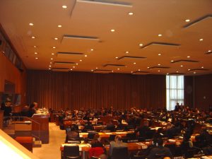 United Nations diplomatic treaty signing session anchoring international humanitarian law frameworks.